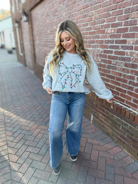 All Lit Up Bow Sweater